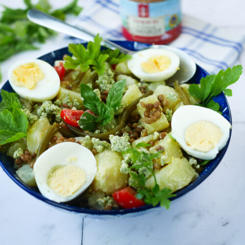Salade de pommes de terre, œufs, haricots verts et lentilles.